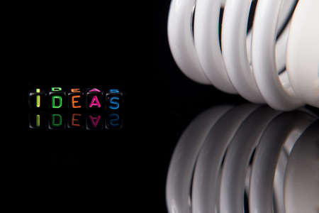 Led light bulb on dark isolated backgroundの写真素材