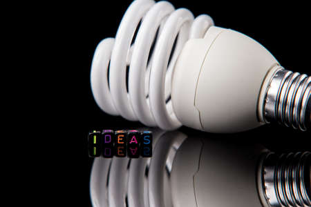 Led light bulb on dark isolated backgroundの写真素材