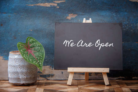 blackboard written "we are open"の写真素材