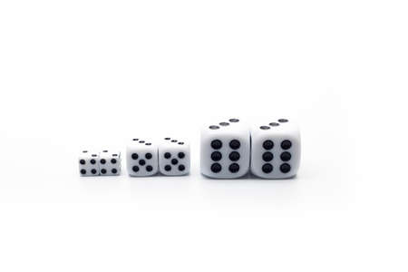 Dice on white isolated background, selective focusの写真素材