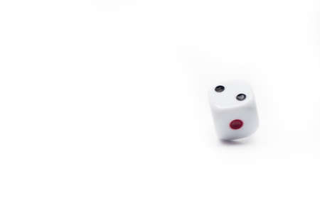 Dice on white isolated background, selective focusの写真素材