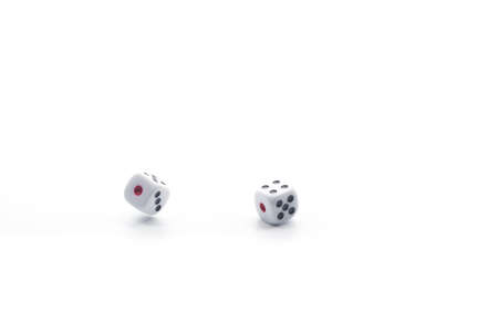 Dice on white isolated background, selective focusの写真素材