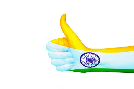 India flag painted on hand showing thumbs up