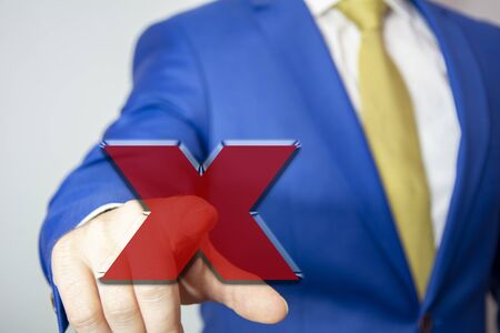 business man touching rejection button on virtual screenの写真素材