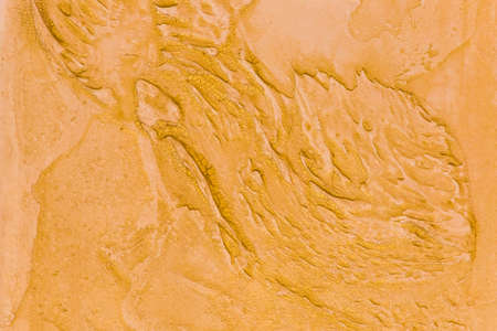 Abstract pattern of modern orange plaster wall surface grunge texture brown background.の写真素材