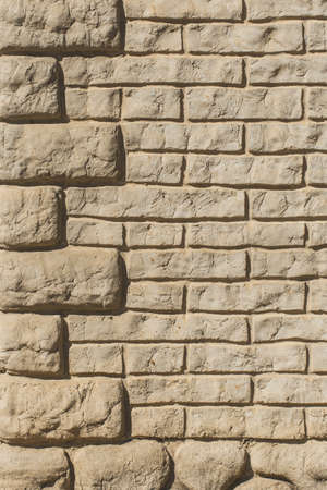 Modern clay brick wall texture, sand stone building facade background.の写真素材