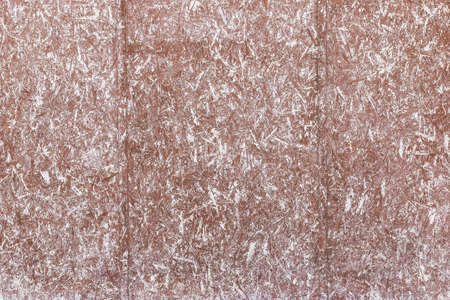 Brown and white surface paint on the press wood texture of the chipboard background.の写真素材