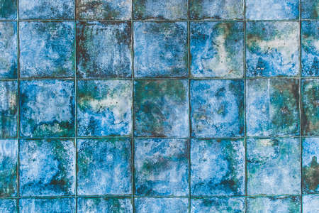 Blue mosaic ceramic tiles with abstract pattern texture background in modern interior.の写真素材