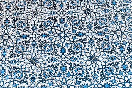 Ceramic floor tiles with abstract pattern blue flower ornament texture background.の写真素材