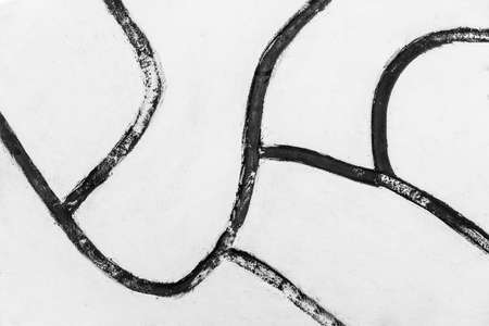 Light white plaster wall with abstract black pattern paint texture background.の写真素材