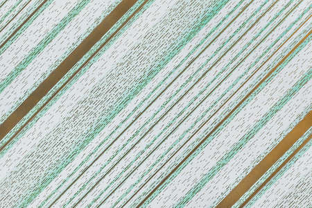 Green wallpaper with abstract diagonal pattern wall texture background.の写真素材