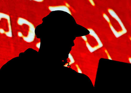 DJ, black silhouette of a man in a cap and headphones on a red background or appeal, propaganda.の写真素材
