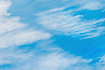 Blue sky with white clouds texture background.の写真素材