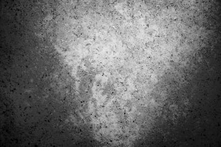 Light and shadow, black and white abstract stone slab texture, grunge patterns, monochrome background.の写真素材