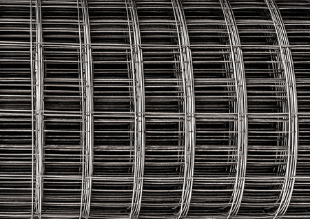 Close-up metal mesh rolls, silver steel wire texture, fencing mesh, building material.の写真素材