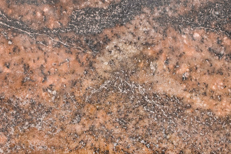 Marble or granite brown old abstract wall pattern texture tile background.