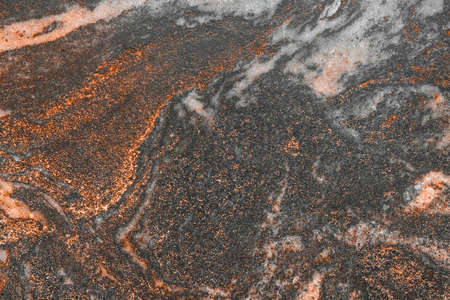 Colored marble stone floor tile with abstract pattern granite old wall texture background.の写真素材