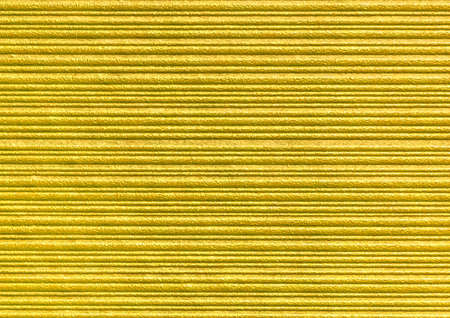 Yellow abstract striped pattern wallpaper background, gold paper texture with horizontal lines.の写真素材