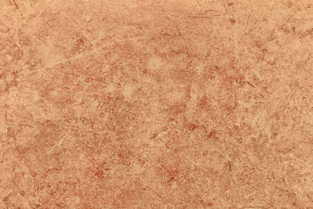 Brown scratched granite surface abstract stone wall old pattern texture background.の写真素材