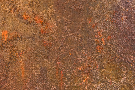 Abstract rusty orange-brown pattern of old metal surface dirty iron texture background.