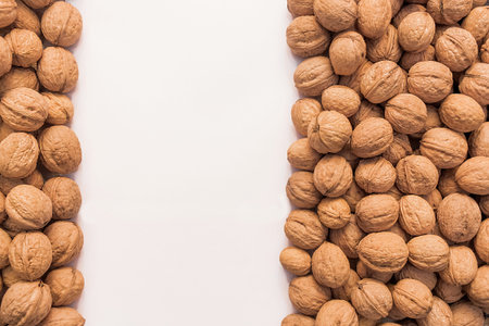 Walnuts mock up, nuts isolated on white background, walnut copy space.