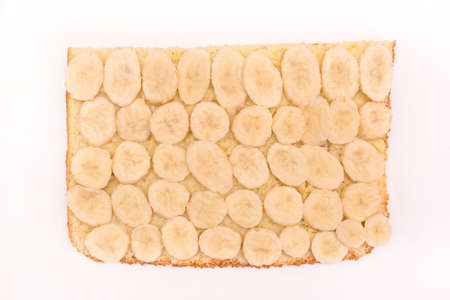 Cooking banana pie, sliced banana isolated on white background.の写真素材