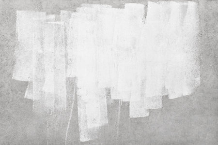White paint strokes for text and design on old gray concrete wall texture background.の写真素材