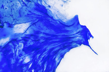 Blue and white light paint abstract pattern of oil, texture background.