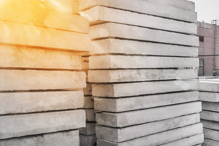 Storage of concrete blocks in a warehouse. Concrete structures at the construction site. Industrial,...