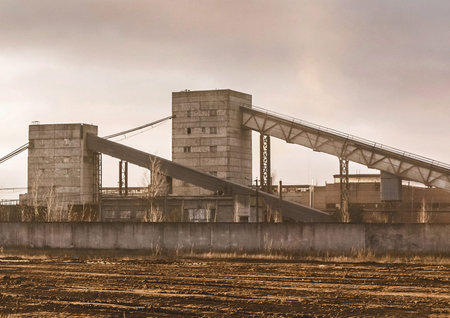 Conveyor belt tower for storing and protecting feed, grain or cement from exposure to water and air. Silo industry, manufacturing, storage tanks on agriculture industrial plant.の写真素材