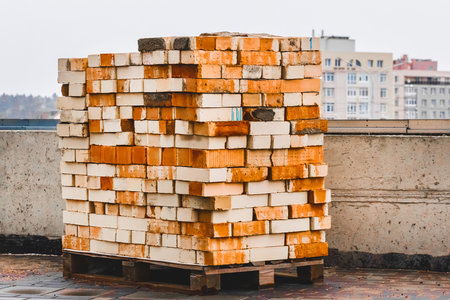 Heap of old white and brown bricks texture background.の写真素材