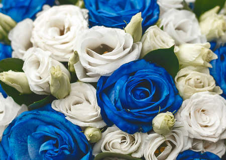 Decorative wedding bouquet of flowers blue and white roses texture background, close-up.の写真素材