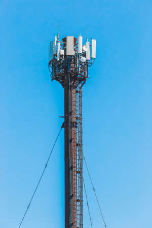 Antenna signal radio high mobile communication network on the background of blue sky.の写真素材