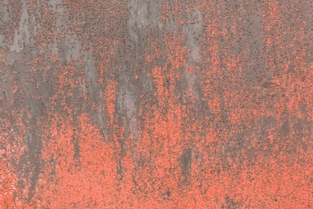 Old dirty wall surface with abstract red pattern texture background.の写真素材