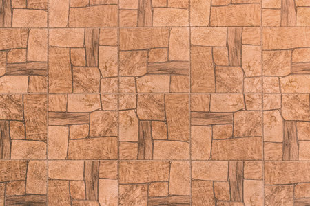 Brown tile floor surface with abstract pattern of stone texture background, top view.の写真素材