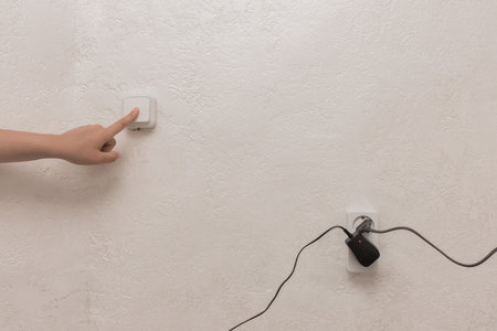 Home electrical appliances, plug and socket safe use, power of connection of electrical equipment.の写真素材