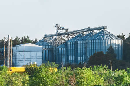 Storage of silo in an industrial tank agriculture, production of grain on the farm manufacturing.の写真素材