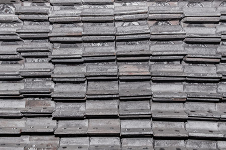 Iron parts of the workpiece for laying railway tracks metal structures in a heap at an industrial...