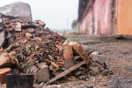 A bunch of industrial waste stone and brick. Garbage dirty disposal and cleaning outdoor.の写真素材