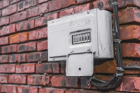 The old broken electrical panel or box of the drawer on the wall. Industrial Abandoned Power Control.の写真素材