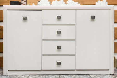 White wooden interior design detail with chest of drawers.の写真素材