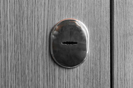 Door lock key open or close exit entrance safe house, close-up.の写真素材