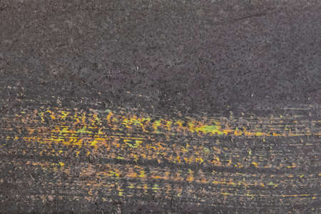 Abstract pattern of colored paint old design on dark background surface.の写真素材