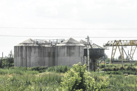 Abandoned fuel oil storage tanks at an industrial plant.