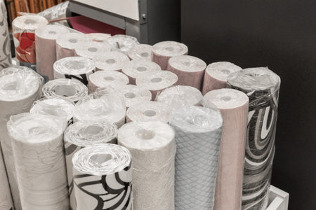 Samples of different wallpaper paper material in rolls for home design and interior decorations of the walls of the room.の写真素材
