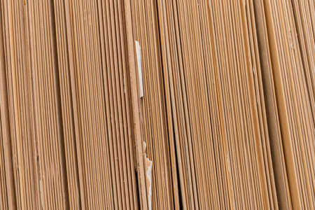 Old sheet cardboard in heap panel cardboard material background.の写真素材