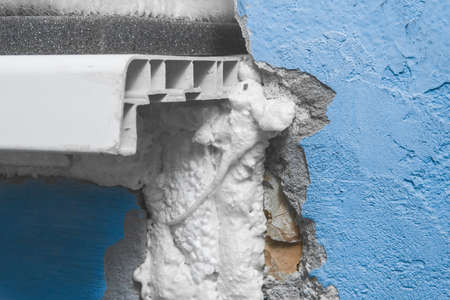 Construction foam, polyurethane foam for installation works, insulation and repair of objects and mountage construction.の写真素材