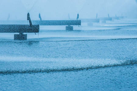 Old steel pipes of the water cooling pipeline system of the combined heat and power industrial plant.の写真素材