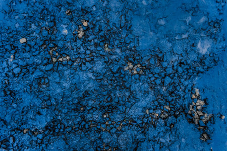 Fuel pollution soil dirt oil blue rough stone surface of the earth toxic industry dark rock...