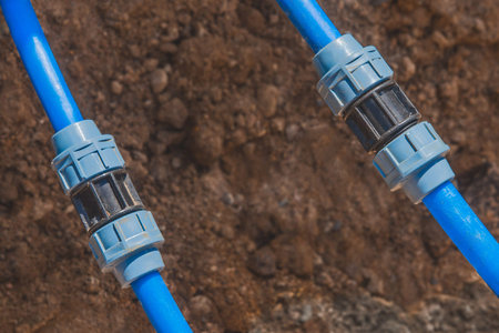 Installation and quick-disconnect connection of polyethylene water pipes of water supply.